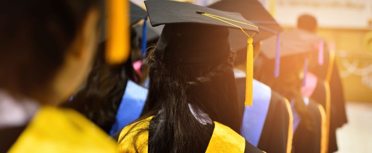 Graduating students in a queue